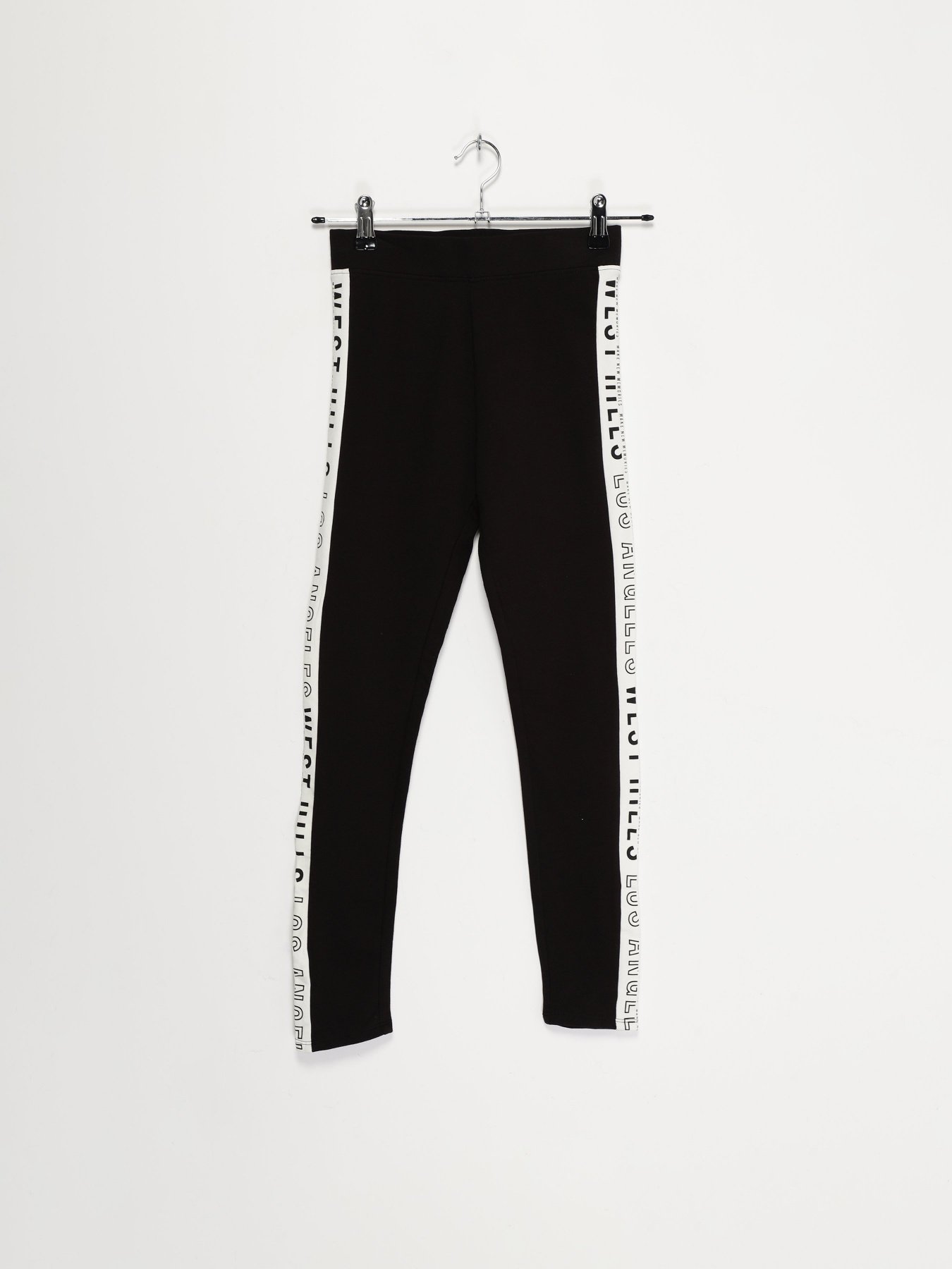 Леггинсы H&M модель 0865977_чорний з білим Фото