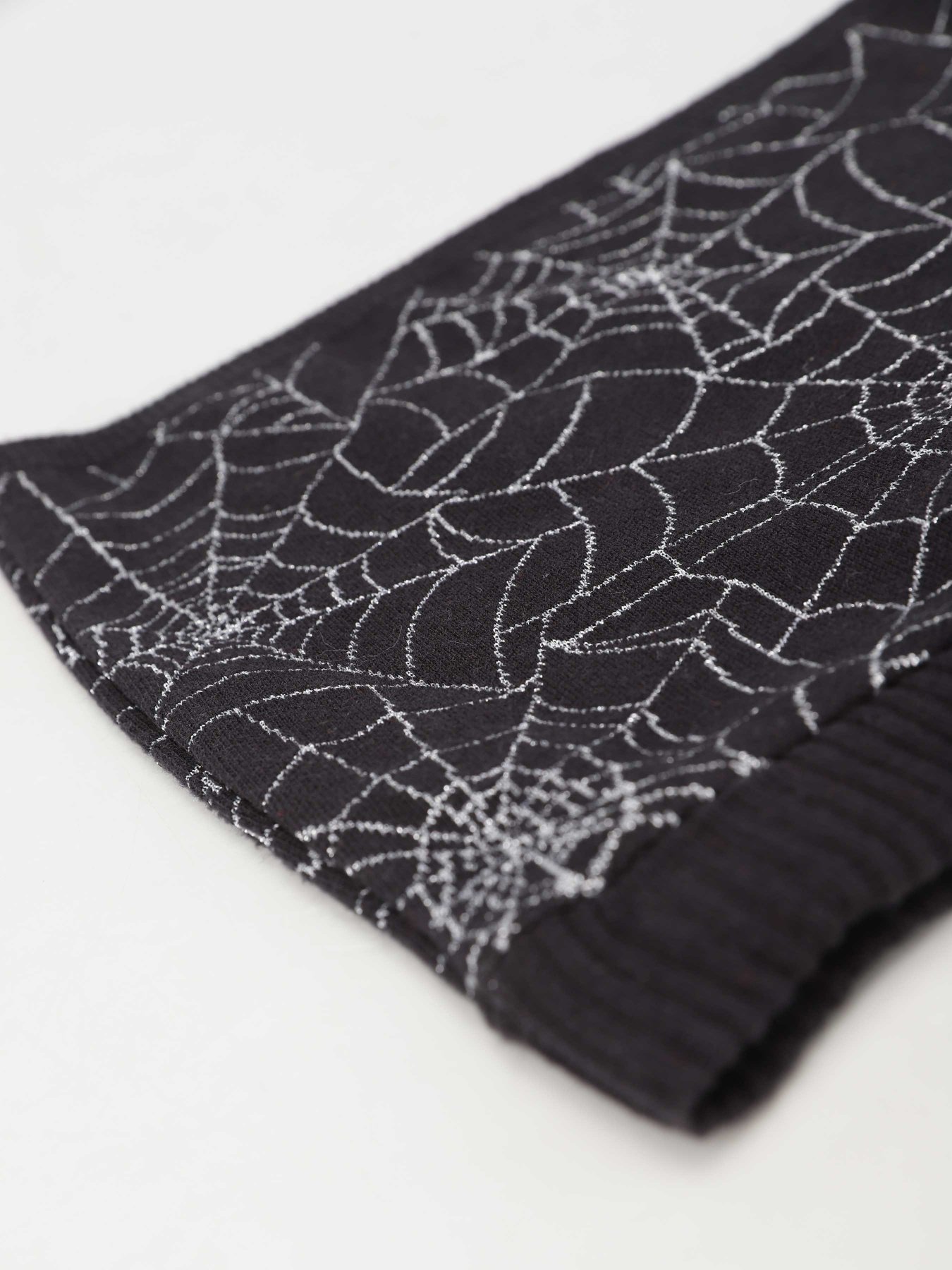 Юбка мини H&M модель 0389983_чорний комб. Фото