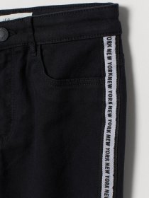 Брюки повседневные H&M модель 0772344_чорний з білим Фото