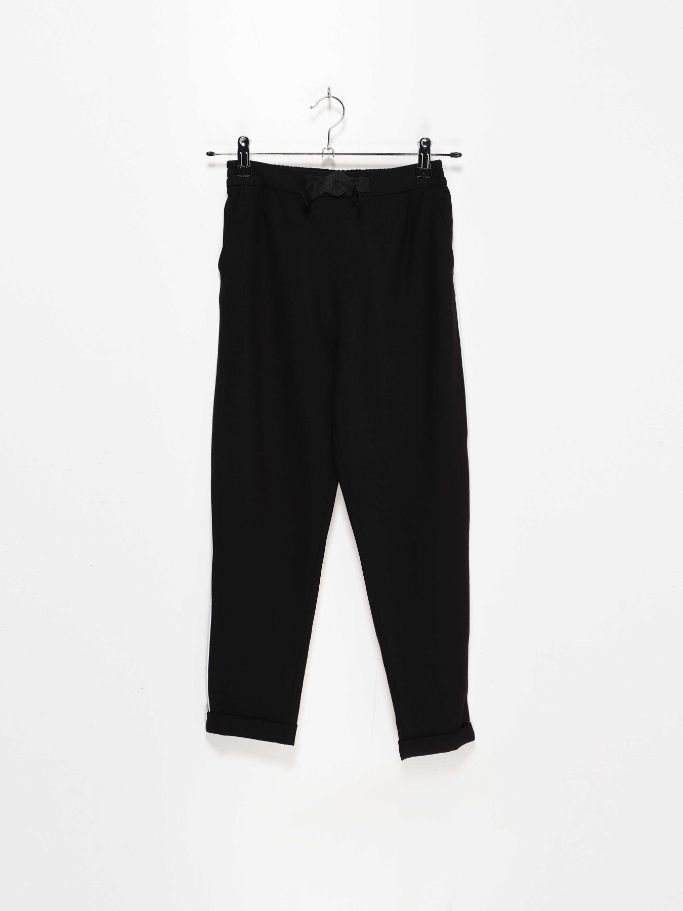 Брюки повседневные H&M модель 0745476_чорний з білим Фото