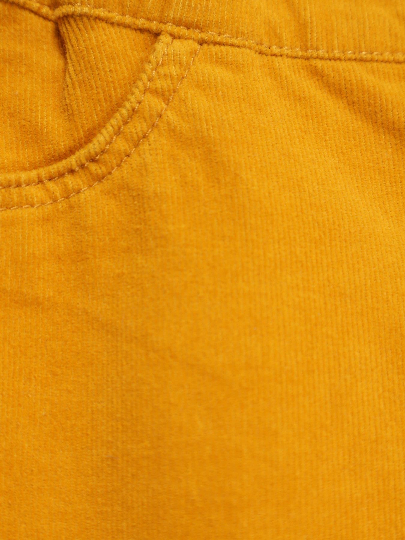 Брюки повседневные H&M модель 0755611_жовтий Фото