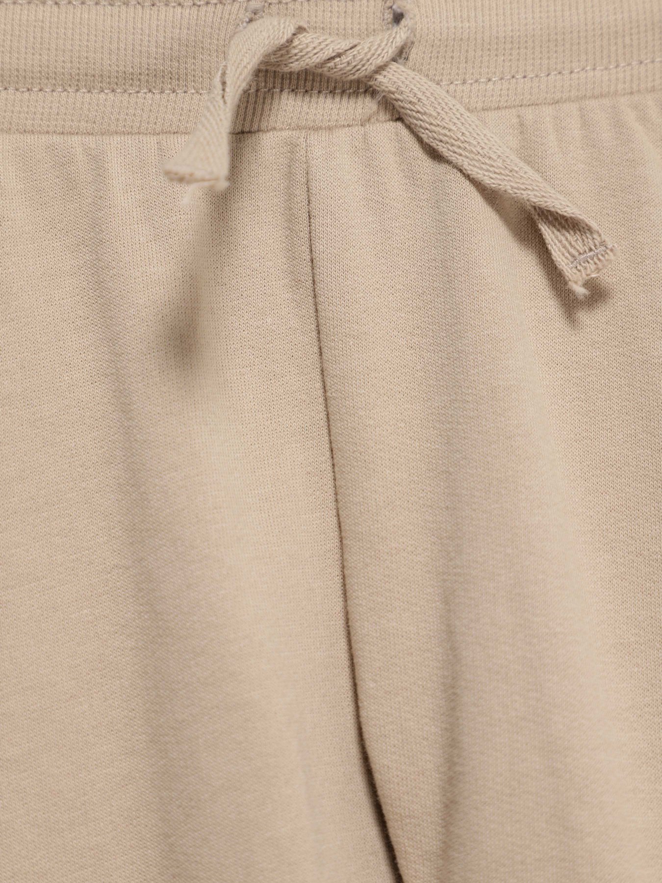 Штаны спортивные H&M модель 0594177_бежевий Фото