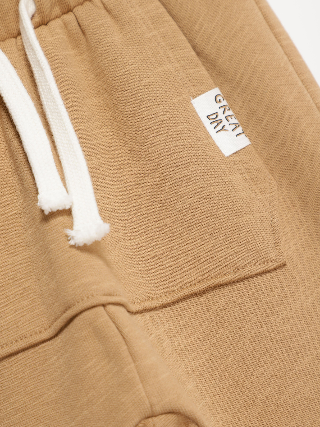 Штаны спортивные H&M модель 0841544_бежевий Фото