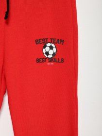 Спортивні штани H&M модель 09283682_червоний комб. Фото