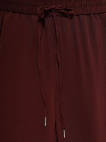 Брюки повседневные H&M модель 0429447_бордовий Фото