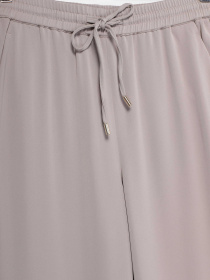 Штани повсякденні H&M модель 0462640_бежевий Фото