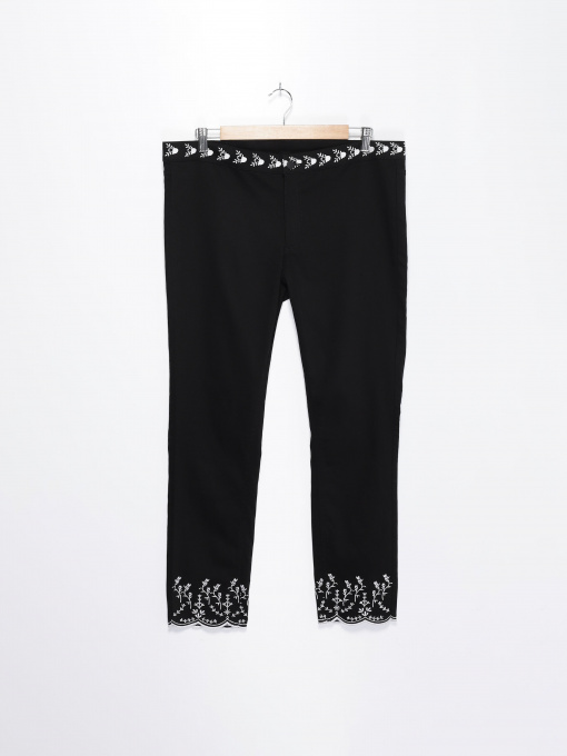 Повседневные штаны H&M модель 0476558_чорний з білим Фото