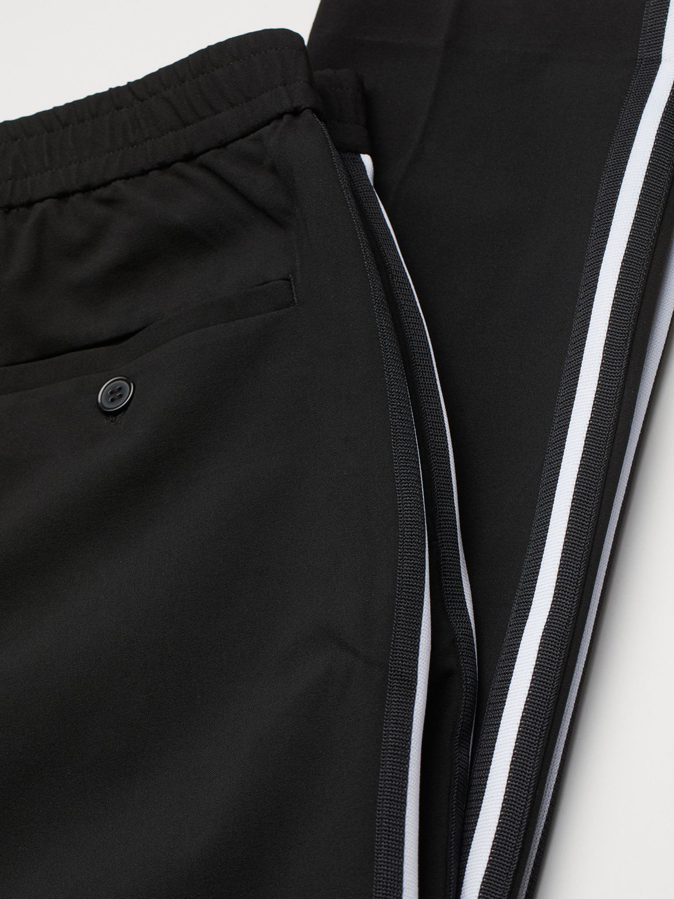 Повсякденні штани H&M модель 0942609_чорний з білим Фото