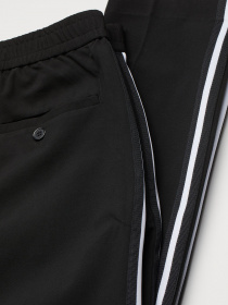 Повсякденні штани H&M модель 0942609_чорний з білим Фото