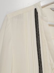 Блуза H&M модель 0502656_молочний Фото