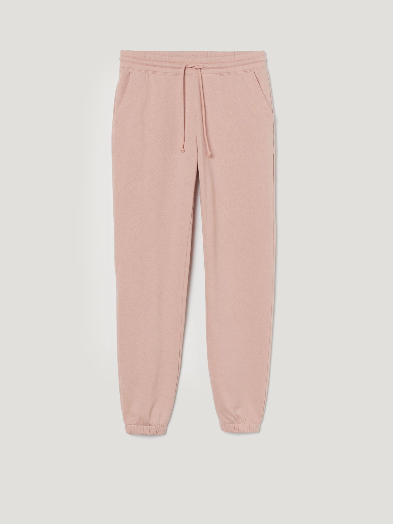 Штани спортивні H&M модель 0547780_персиковий Фото