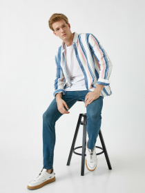 Завужені джинси Koton модель 2KAM43586MD700 Фото