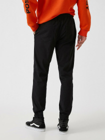 Повсякденні штани Koton модель 2KAM41213BW999 Фото