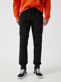 Повсякденні штани Koton модель 2KAM41213BW999 Фото