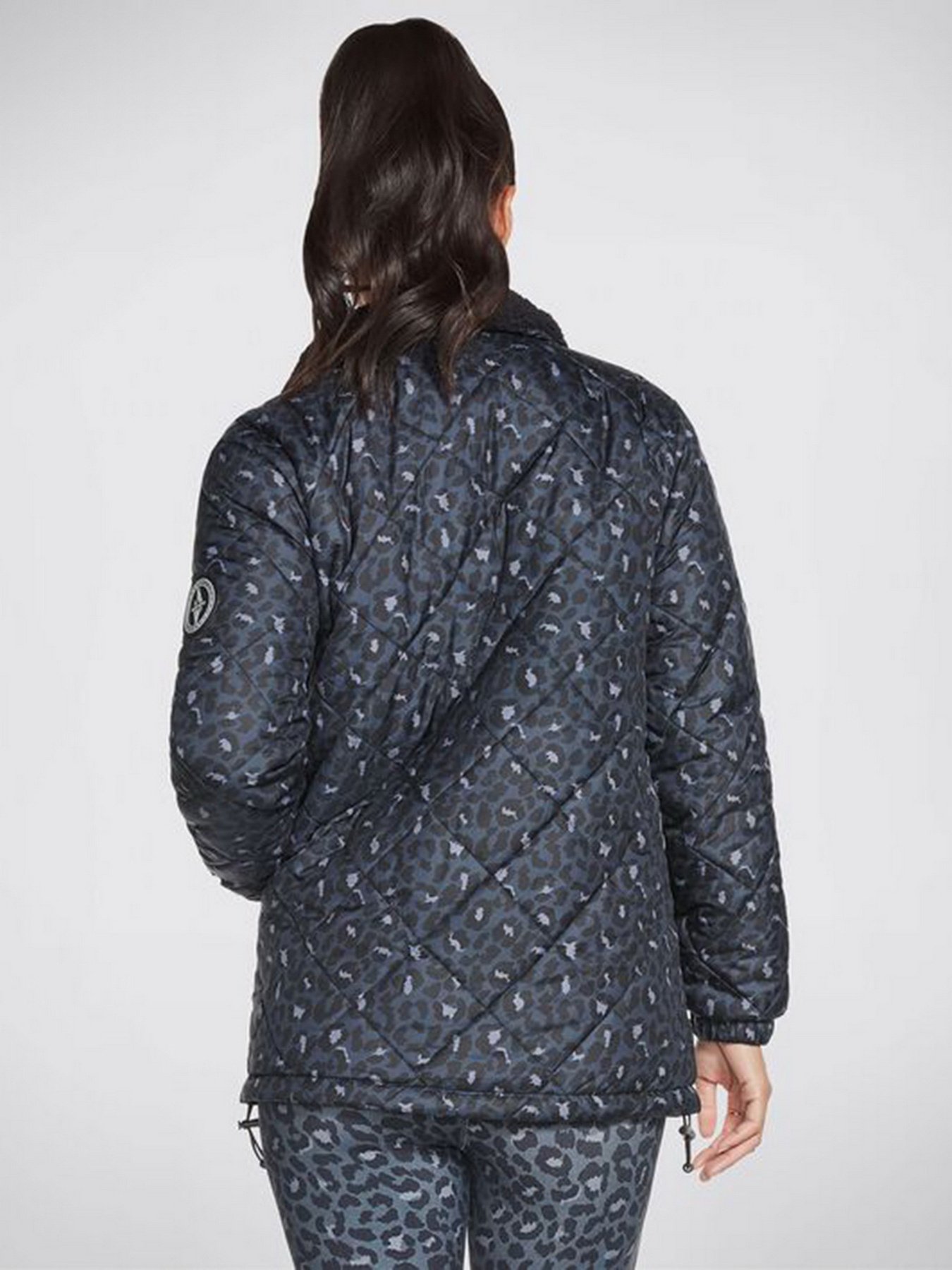 Демісезонна куртка Skechers GOwalk Wear Midnight Puffer Jacket модель W3JA251 BKNV Фото