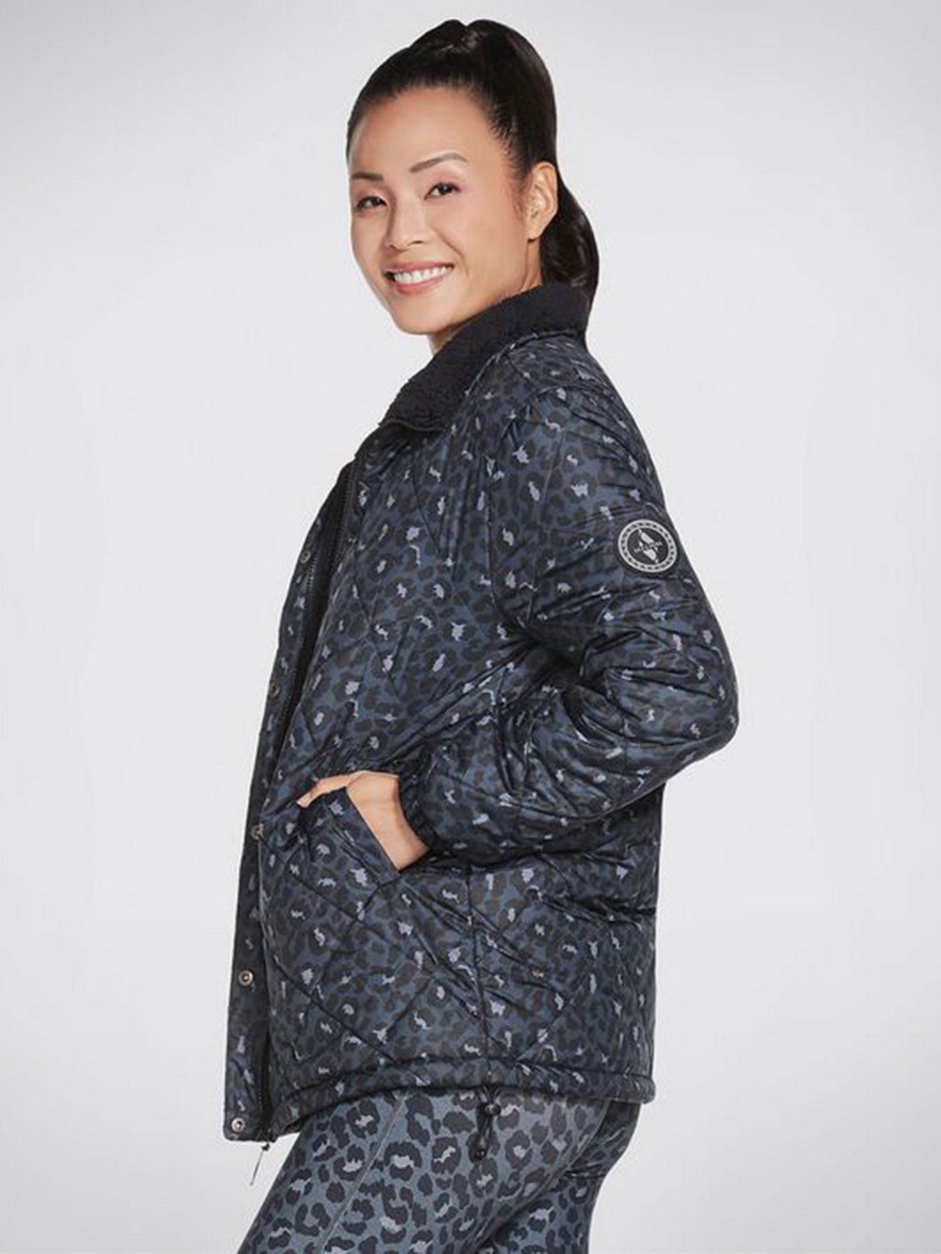 Демісезонна куртка Skechers GOwalk Wear Midnight Puffer Jacket модель W3JA251 BKNV Фото