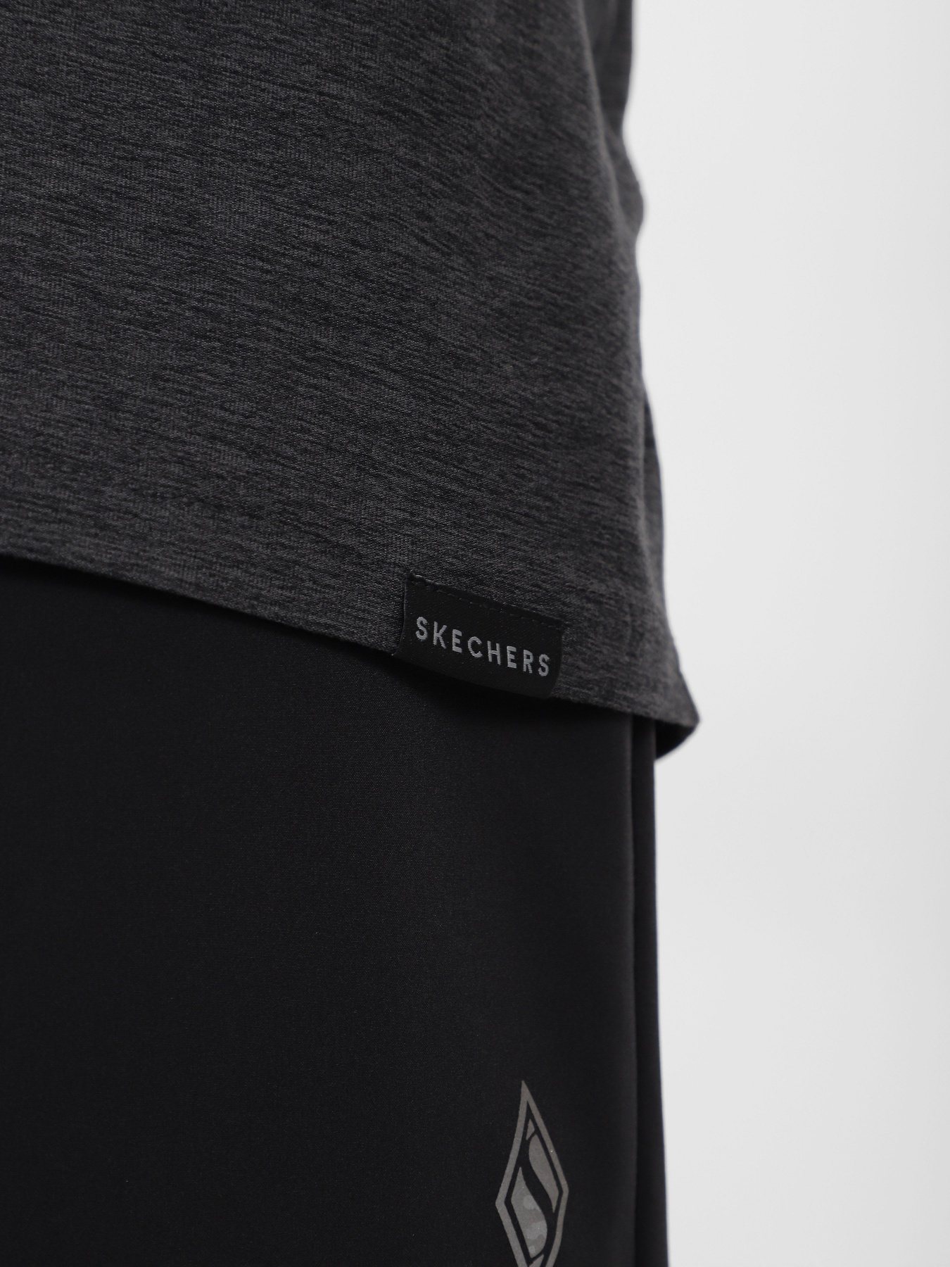 Футболка спортивная Skechers GO DRI All Day модель MTS360 BKCC Фото