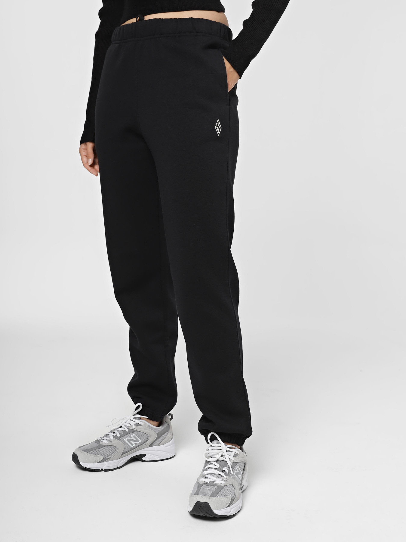 Спортивні штани Skechers Sketch-Sweats Classic модель PT5 BLK Фото