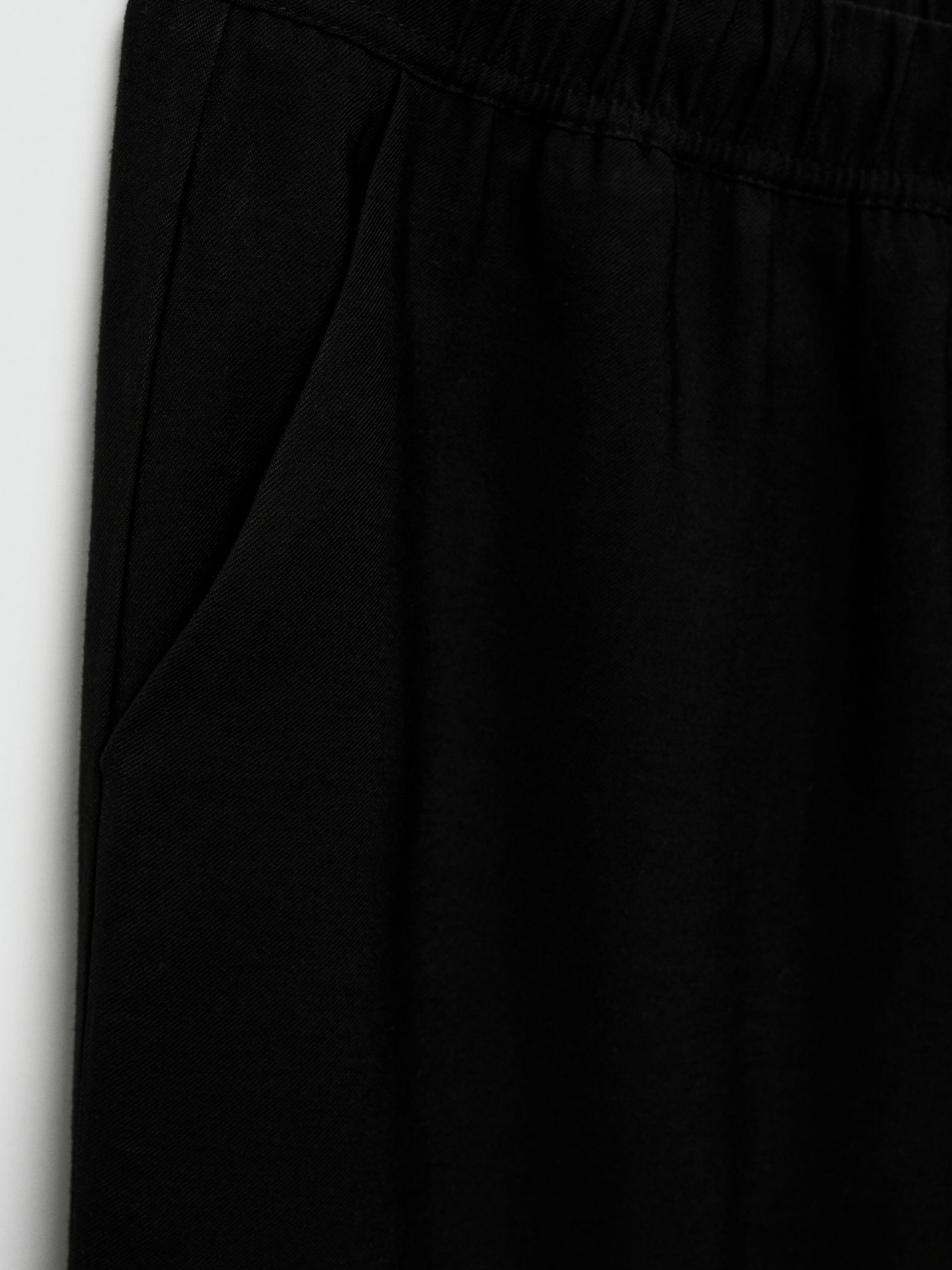 Повседневные штаны MANGO Fluido модель 77060350_99 Повседневные штаны MANGO Fluido модель 77060350_99 Фото