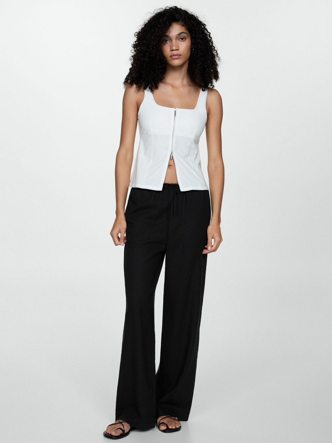 Повсякденні штани MANGO модель 77040372_99 Фото