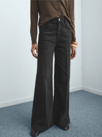 Расклешенные джинсы MANGO модель 17015801_TN Фото