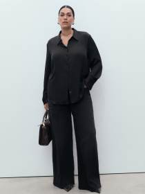 Расклешенные джинсы MANGO модель 17015801_TN Фото