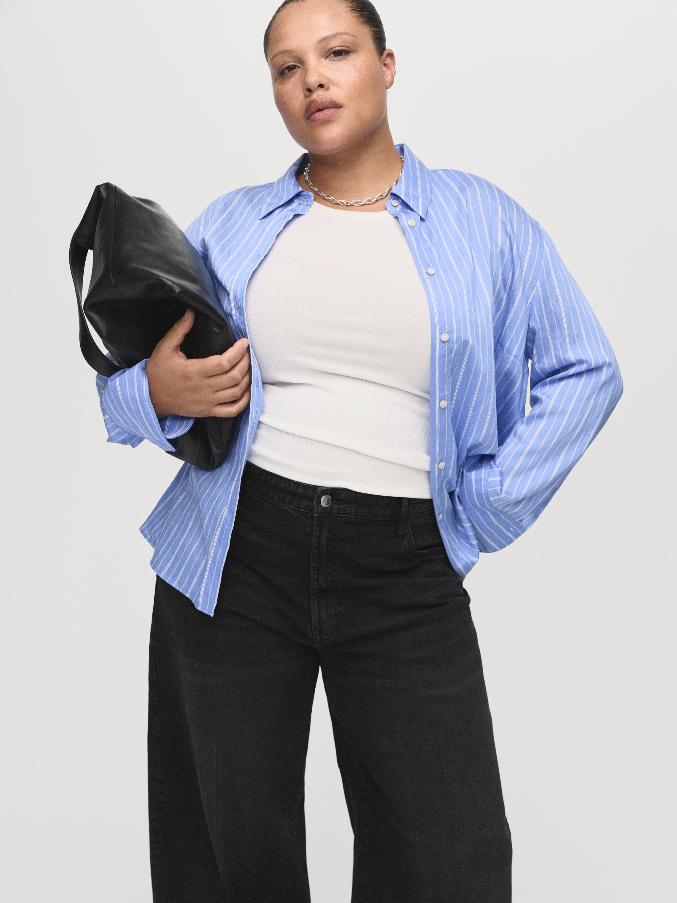 Расклешенные джинсы MANGO модель 27021196_TN Фото