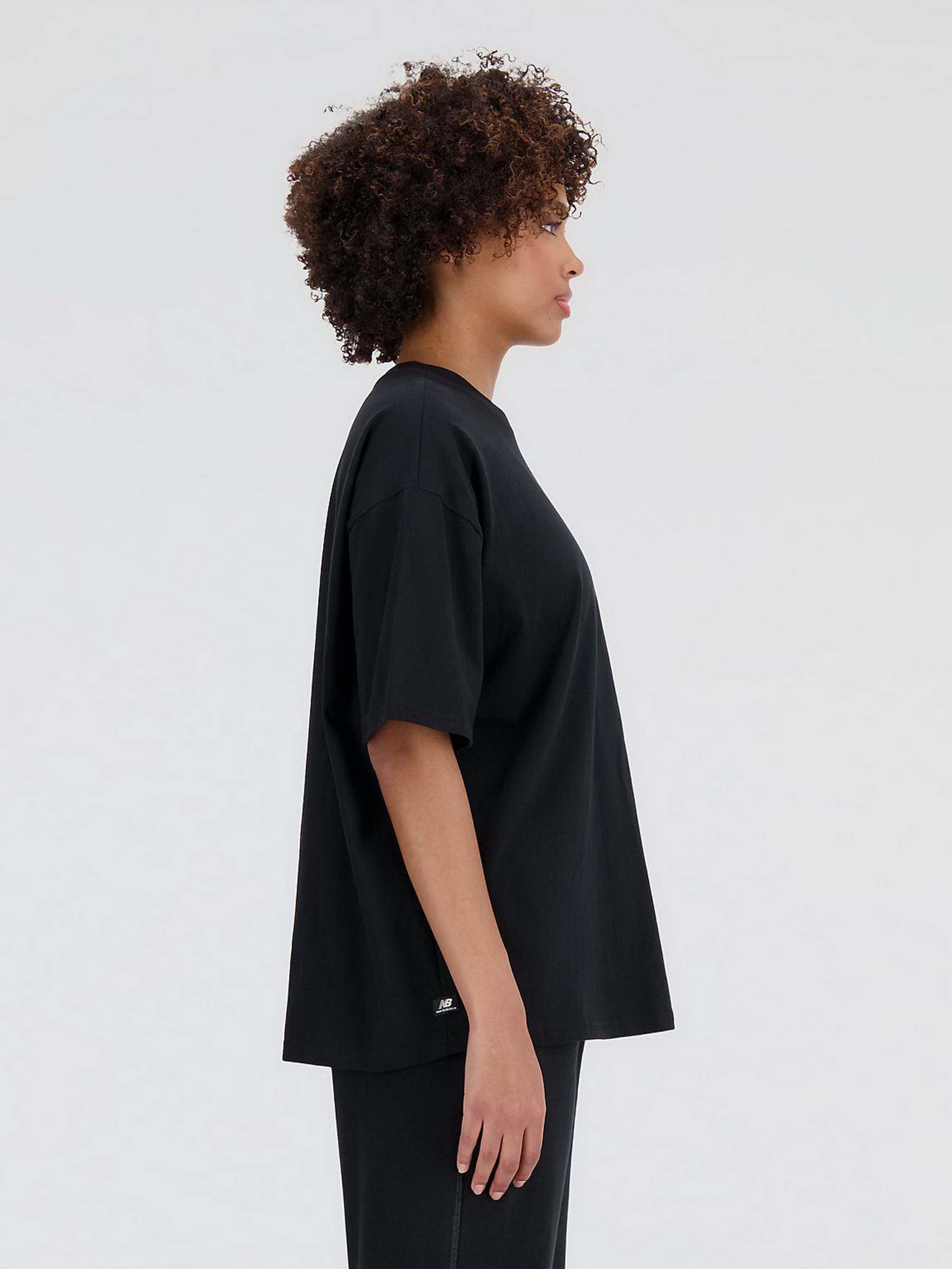 Футболка New Balance Essentials Graphic модель WT33525BK Фото