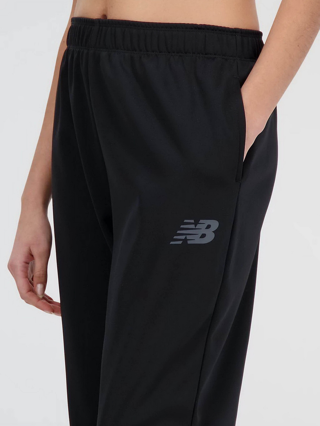 Спортивні штани New Balance Relentless Performance Fleece модель WP33188BK Фото