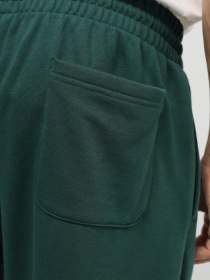 Повсякденні штани New Balance SMALL LOGO модель MP41519NWG Повсякденні штани New Balance SMALL LOGO модель MP41519NWG Фото