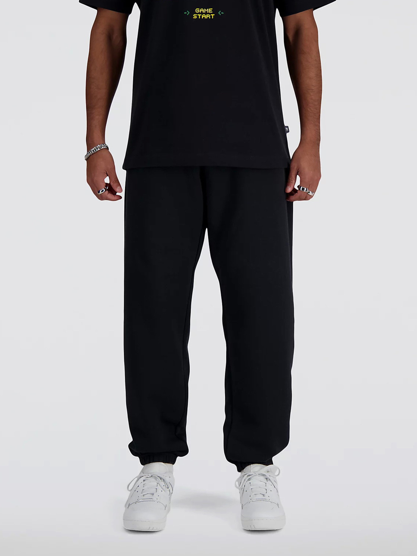 Штаны спортивные New Balance SPORT ESSENTIALS FLEECE модель MP41503BK Фото