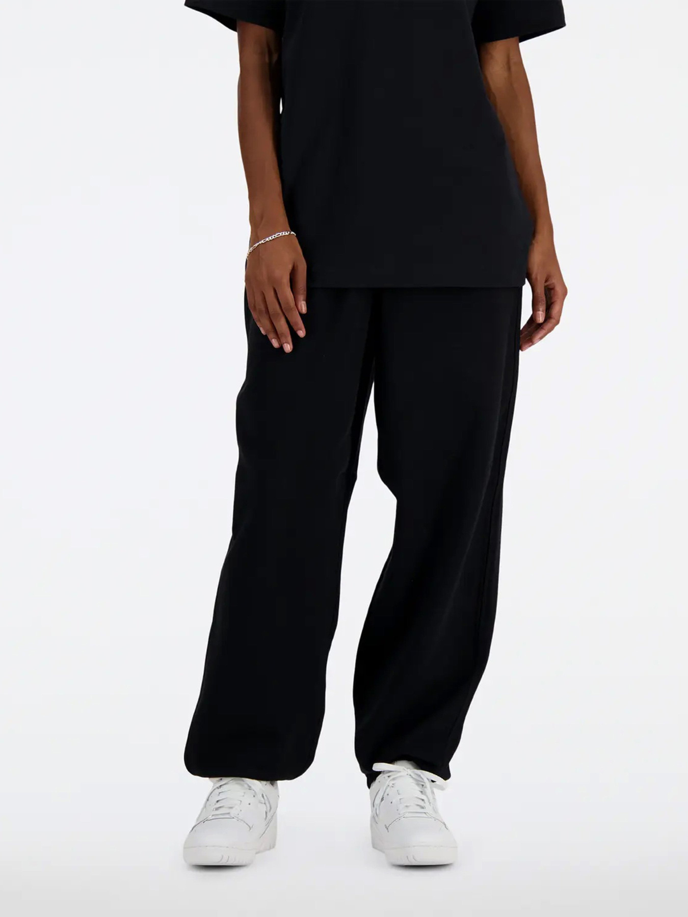 Штаны спортивные New Balance ATHLETICS модель WP41513BK Штаны спортивные New Balance ATHLETICS модель WP41513BK Фото