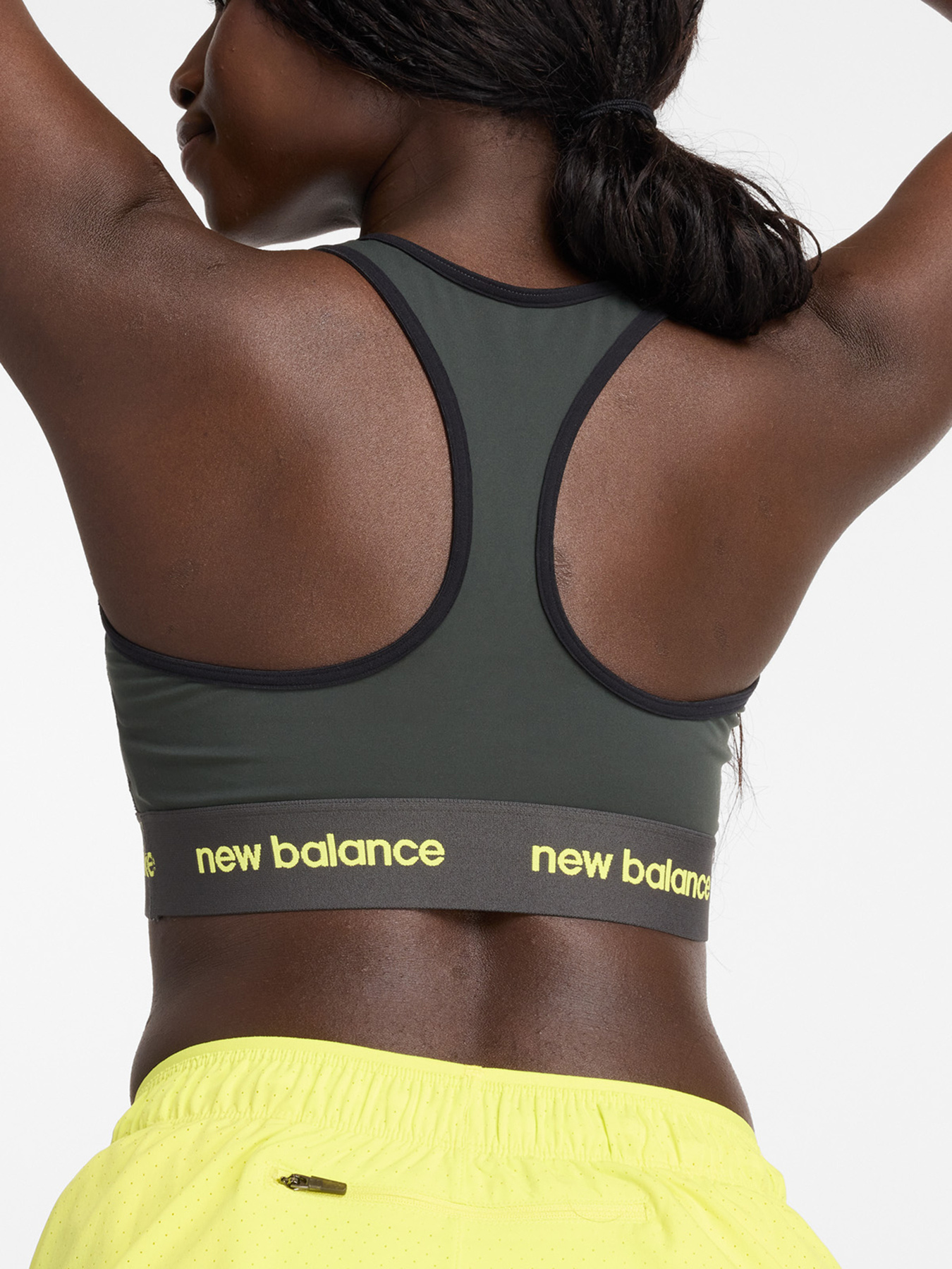 Топ спортивний New Balance Sleek Support Модель WB41048ACK Фото