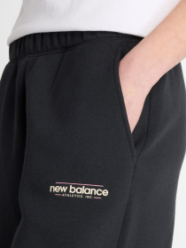 Спортивні штани New Balance REIMAGINED модель WP53505BK Фото