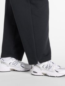 Спортивні штани New Balance REIMAGINED модель WP53505BK Фото