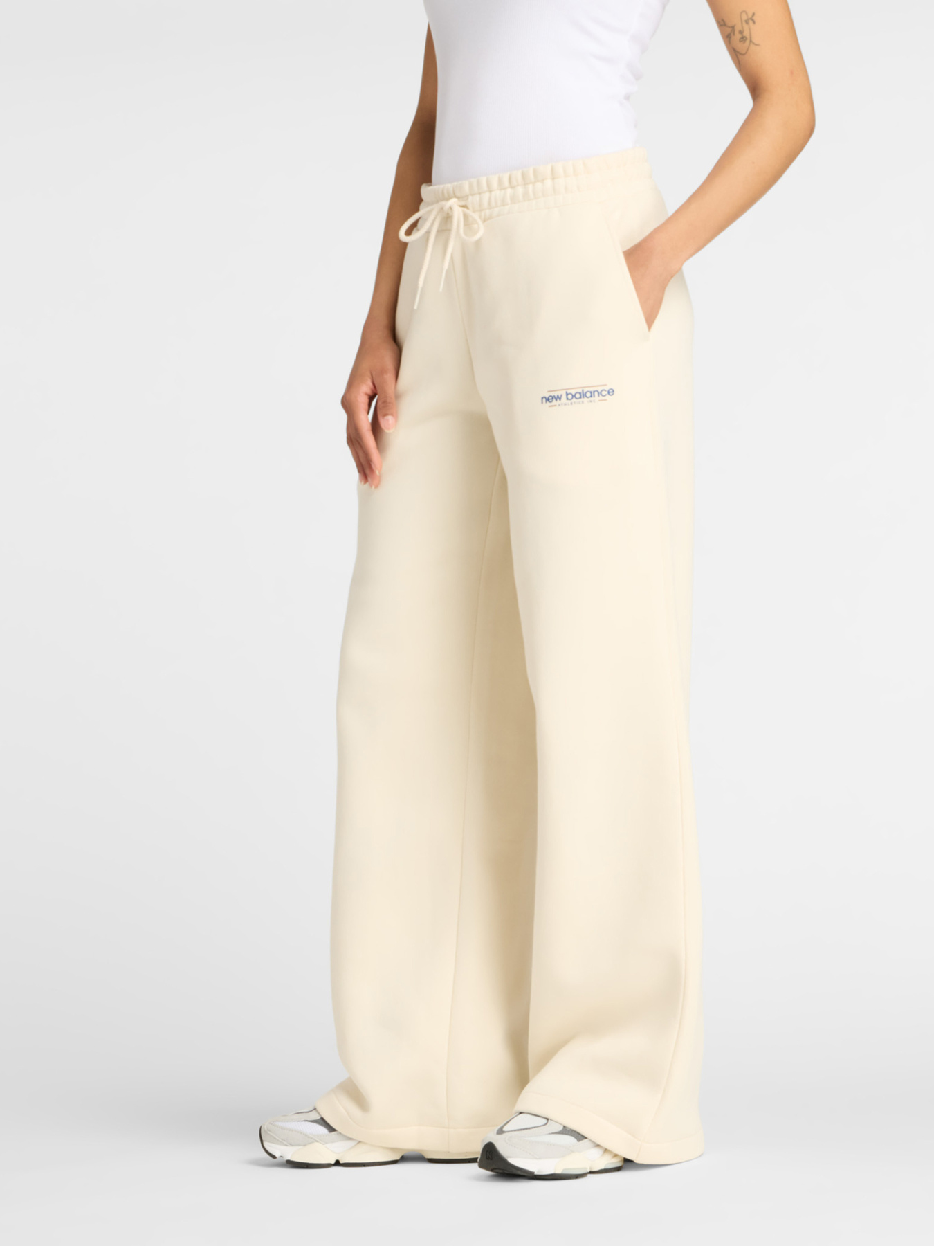 Штаны спортивные New Balance REIMAGINED модель WP53903LIN Фото