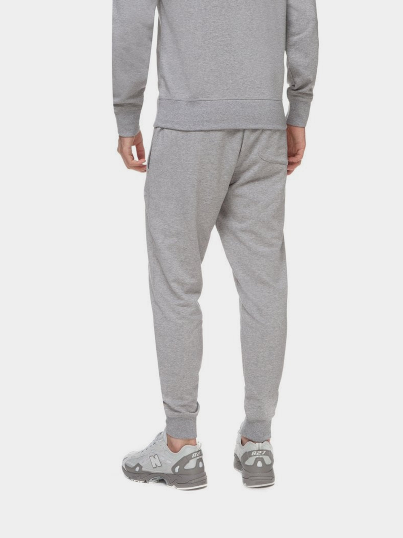 Штаны спортивные New Balance Essentials Stacked Logo модель MP03558AG Фото