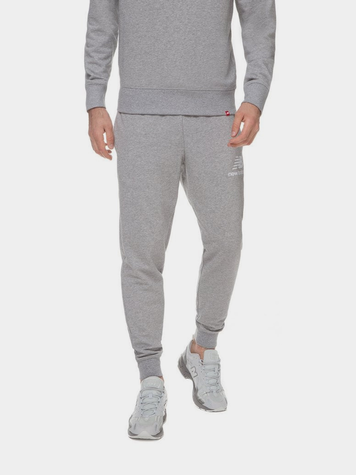 Штаны спортивные New Balance Essentials Stacked Logo модель MP03558AG Фото