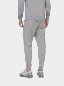 Штаны спортивные New Balance Essentials Stacked Logo модель MP03558AG Фото