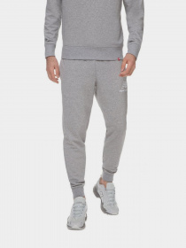 Штаны спортивные New Balance Essentials Stacked Logo модель MP03558AG Фото
