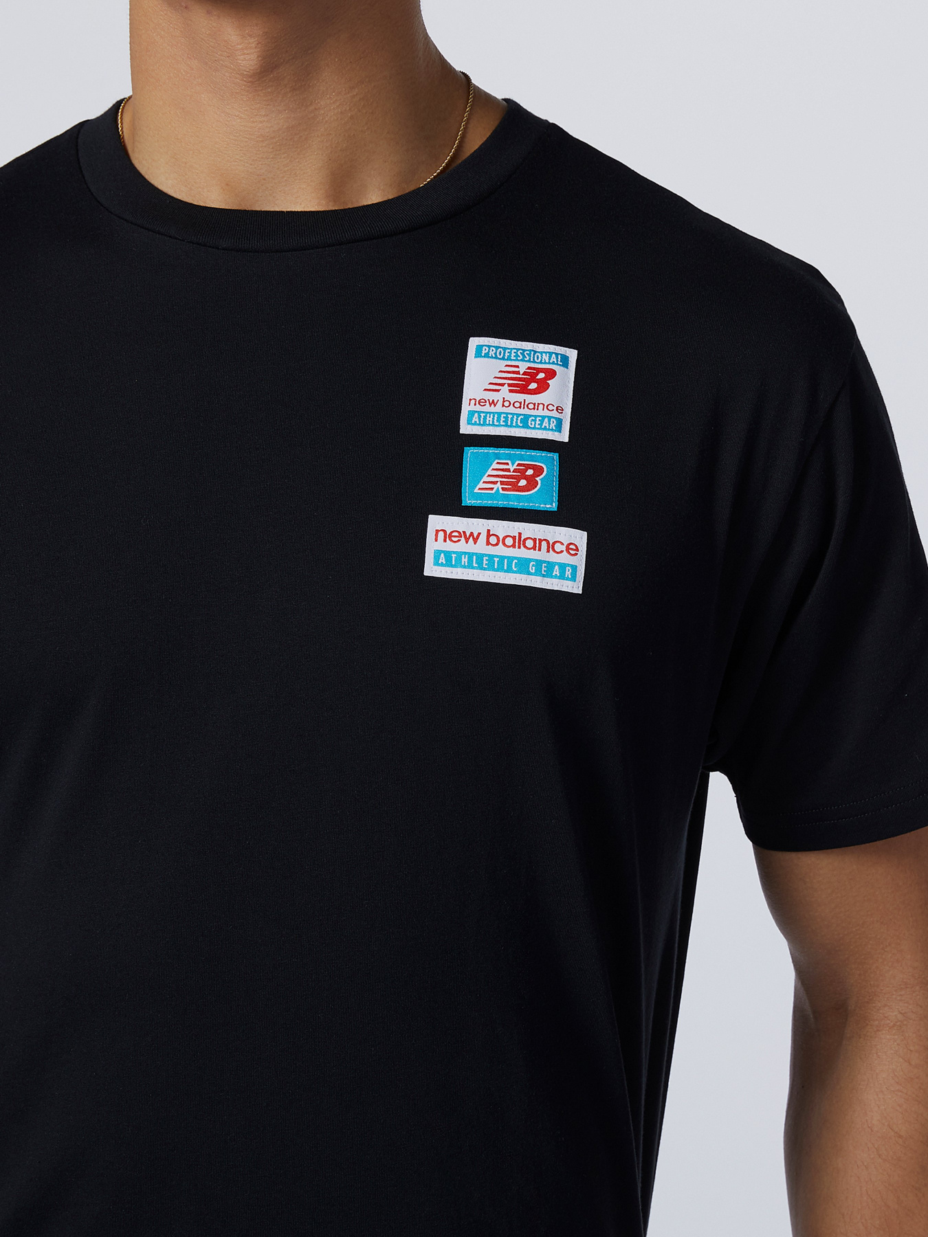 Футболки і поло New Balance Essentials модель MT11516BK Фото