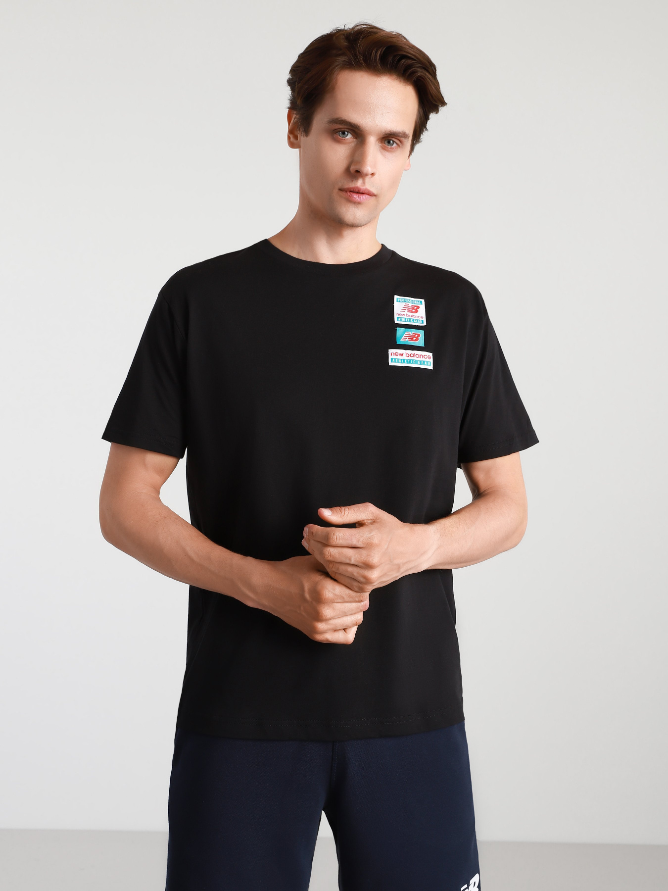 Футболки і поло New Balance Essentials модель MT11516BK Фото