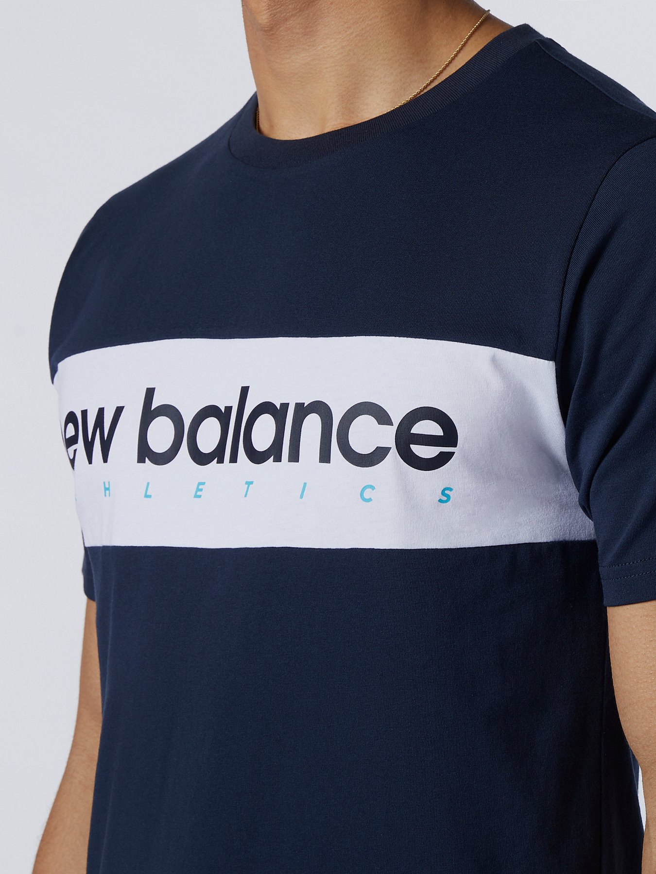 Футболки і поло New Balance  Athletics Linear модель MT11548ECL Фото
