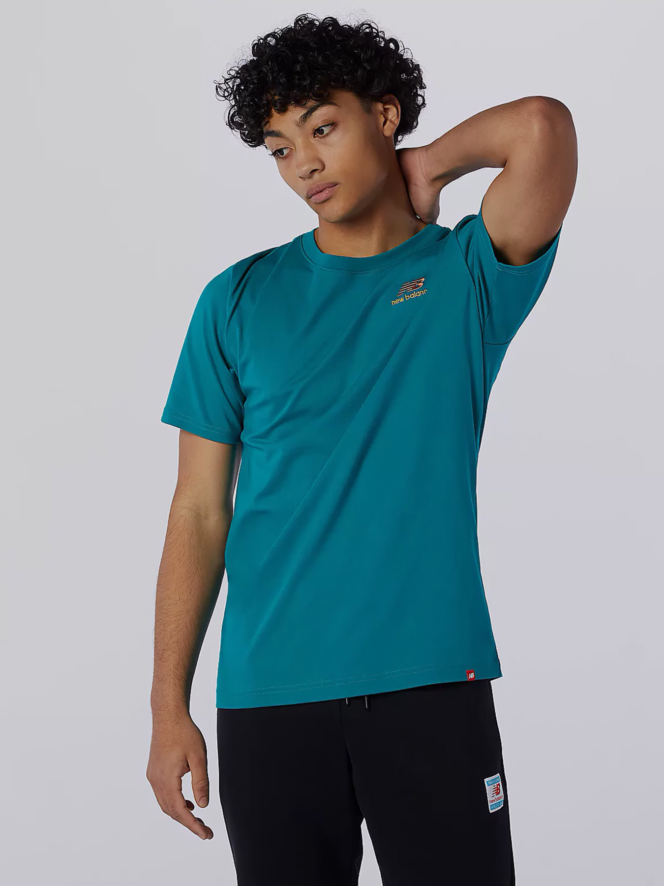 Футболки і поло New Balance Essentials Embriodered модель MT11592TMT Футболки і поло New Balance Essentials Embriodered модель MT11592TMT Фото