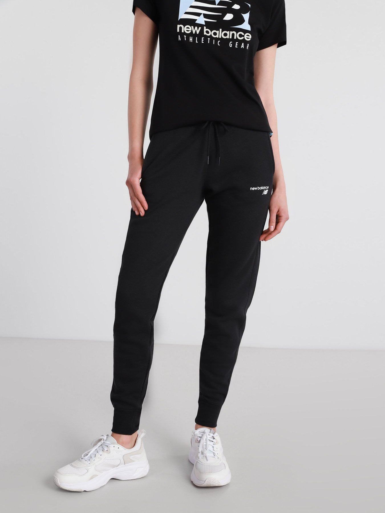 Спортивні штани New Balance CLASSIC CF модель WP03805BK Фото