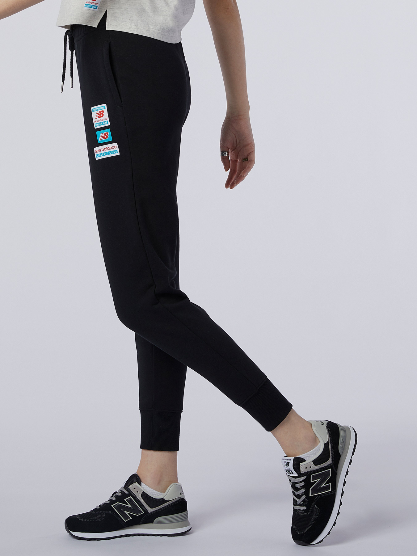 Штани спортивні New Balance Essentials Field Day модель WP11507BK Фото