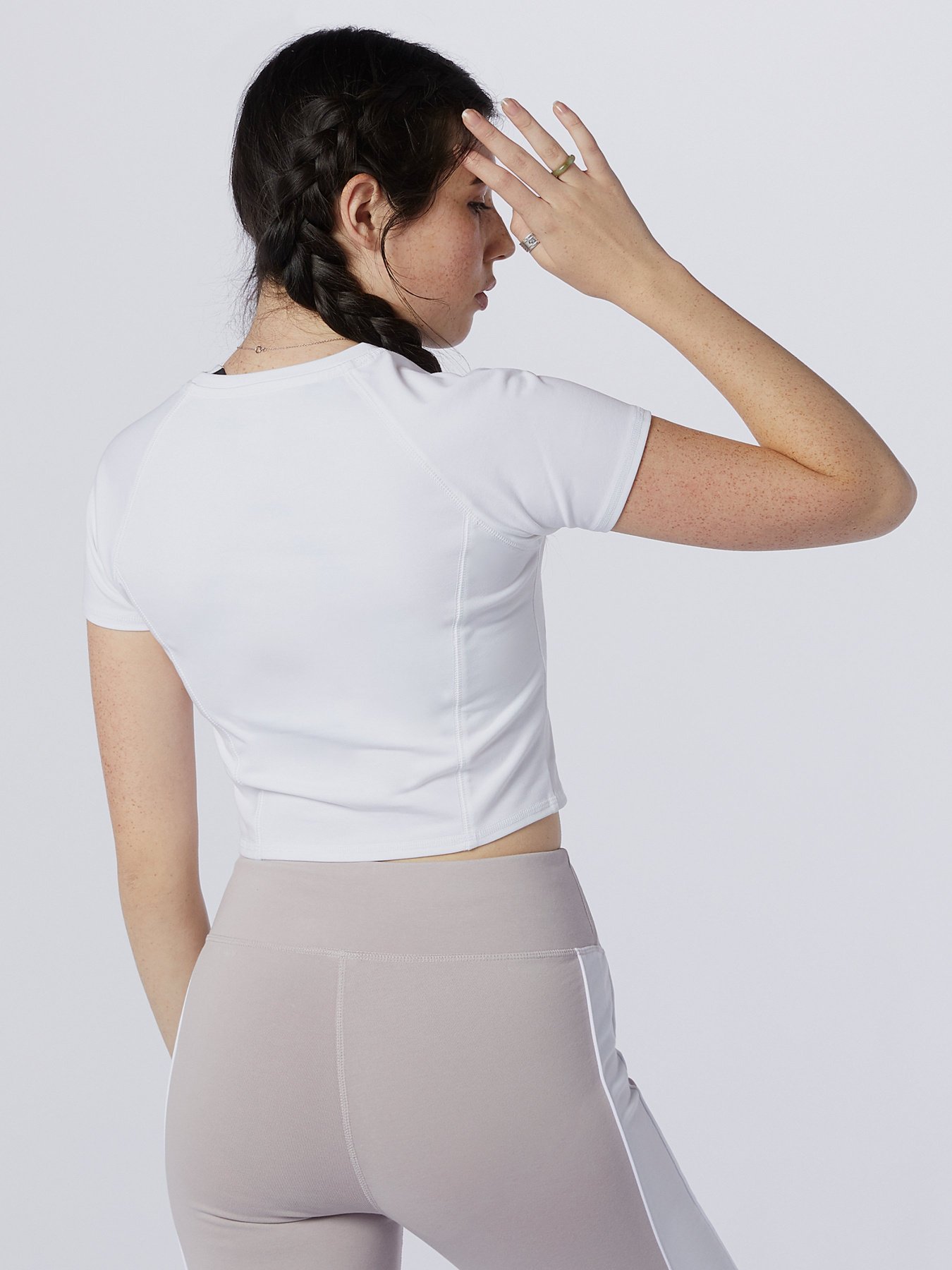 Футболка спортивная New Balance Athletics Podium модель WT03503WY Фото