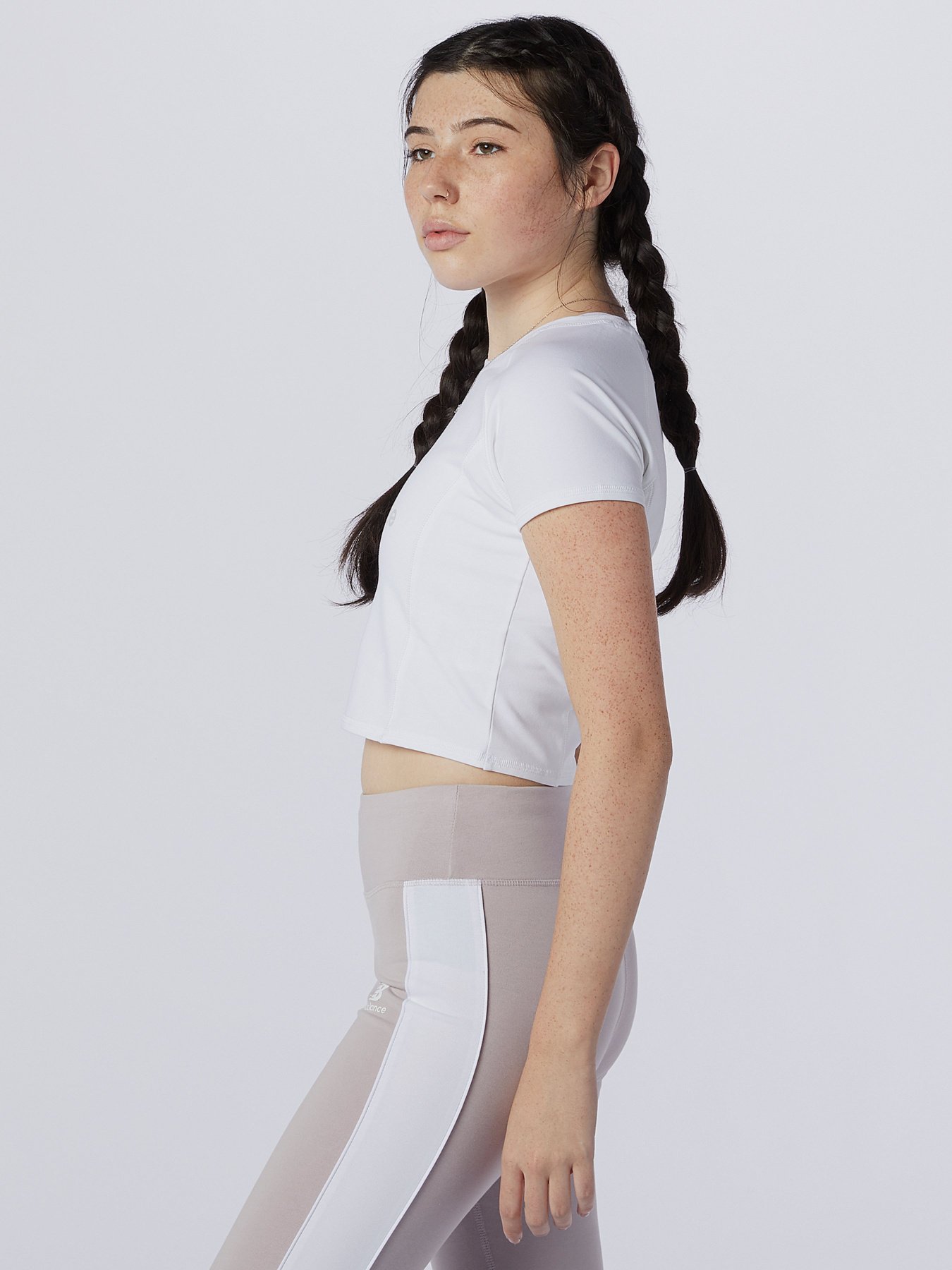 Футболка спортивная New Balance Athletics Podium модель WT03503WY Фото