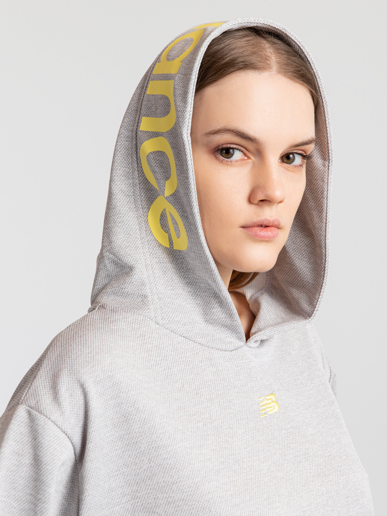 Худи New Balance Relentless модель WT11169AG Фото