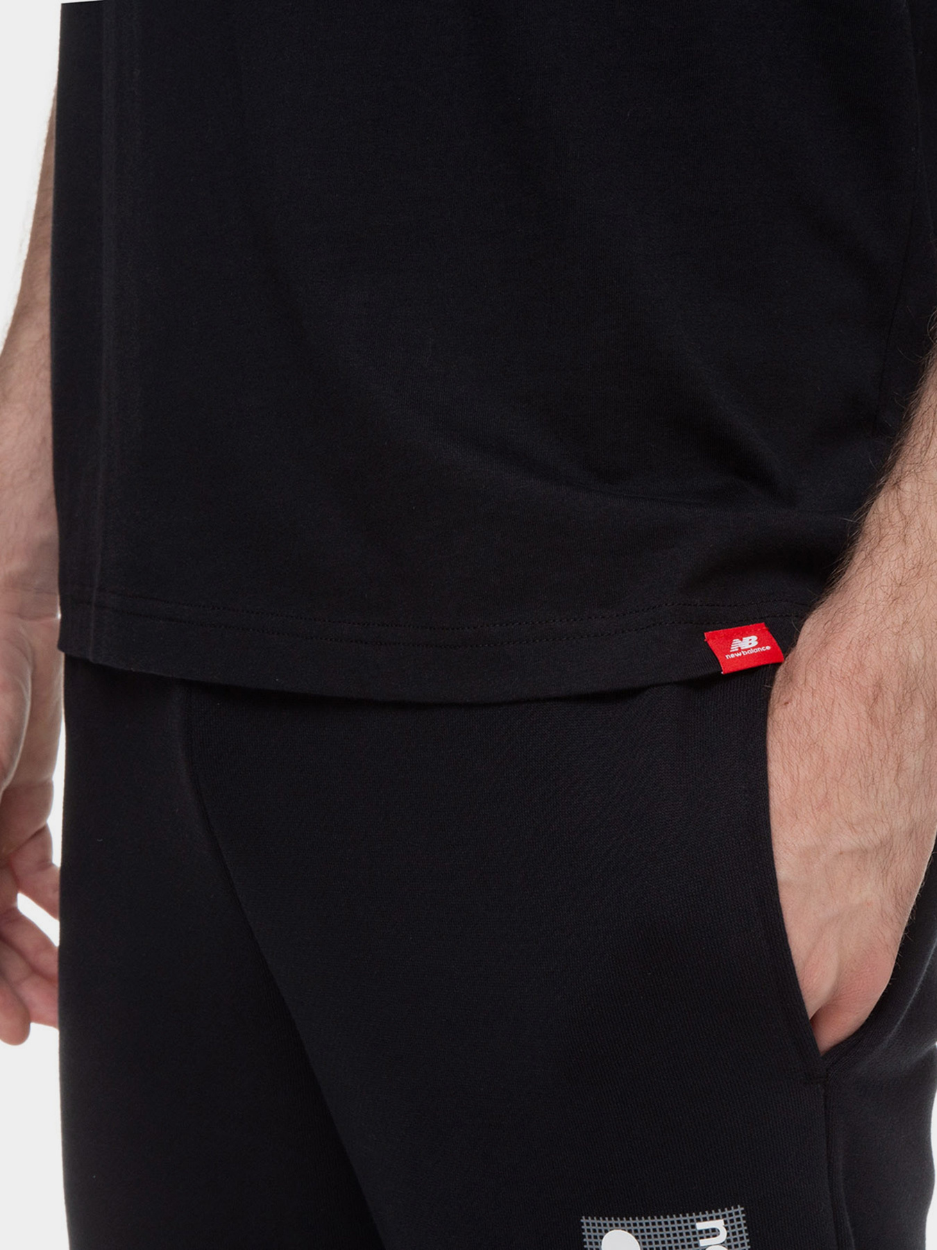 Футболки і поло New Balance Essentials Teerain модель MT03553BK Фото